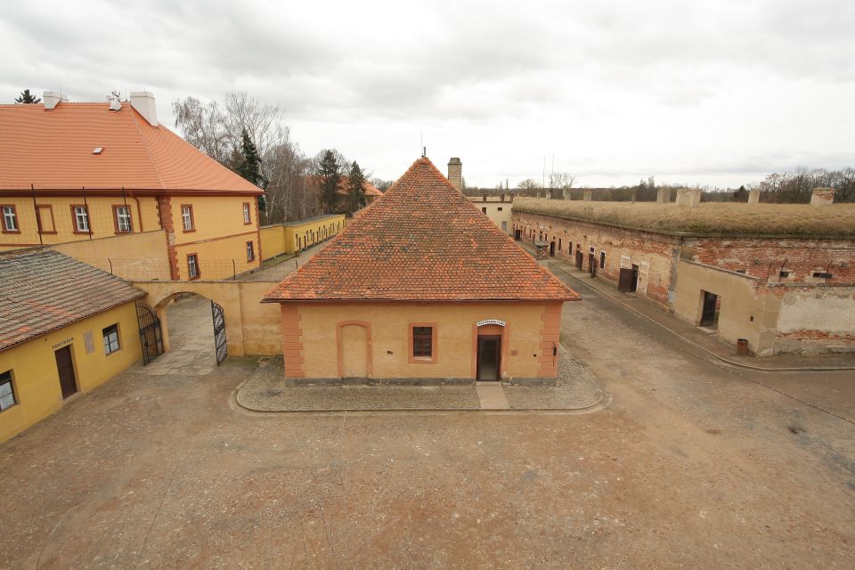 From Prague: All-inclusive Bus Tour to Terezin Memorial - Walking, Comfort, and What to Bring for a Respectful Day