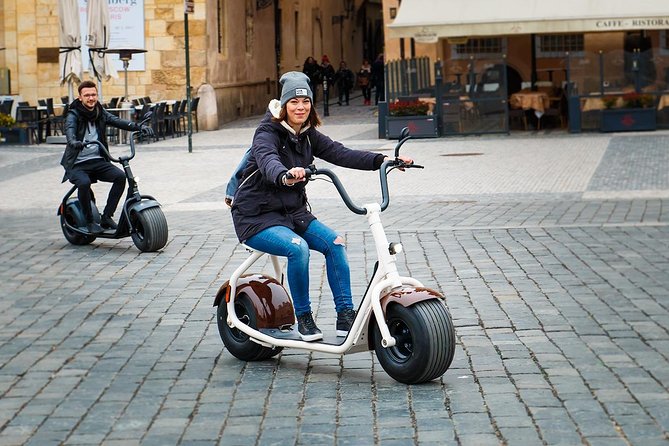 Grand city tour on Scrooser in Prague - Old Town Square and the Astronomical Clock break you’ll want