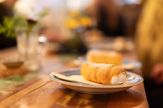 Prague by Night: Drinks & Food Tour with Eating Europe - Seminář Café near Charles Bridge: garlic spread, rolls, and a drink choice