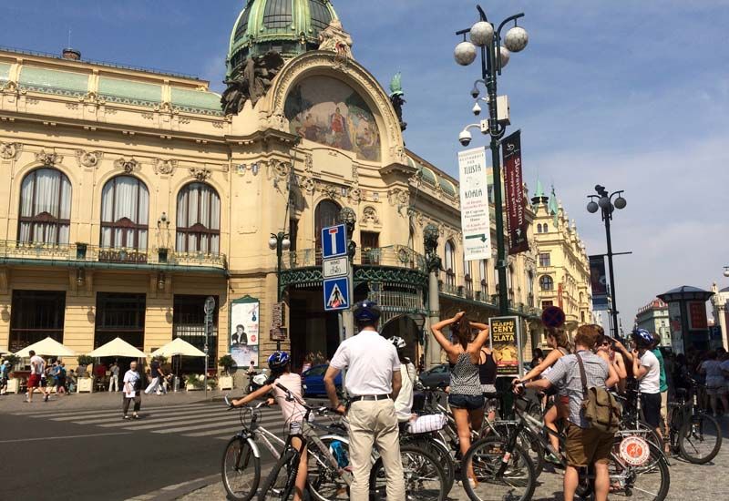 Prague: Classic City Bike Tour - John Lennon Wall and Charles Bridge: Iconic Photos, Real-World Traffic