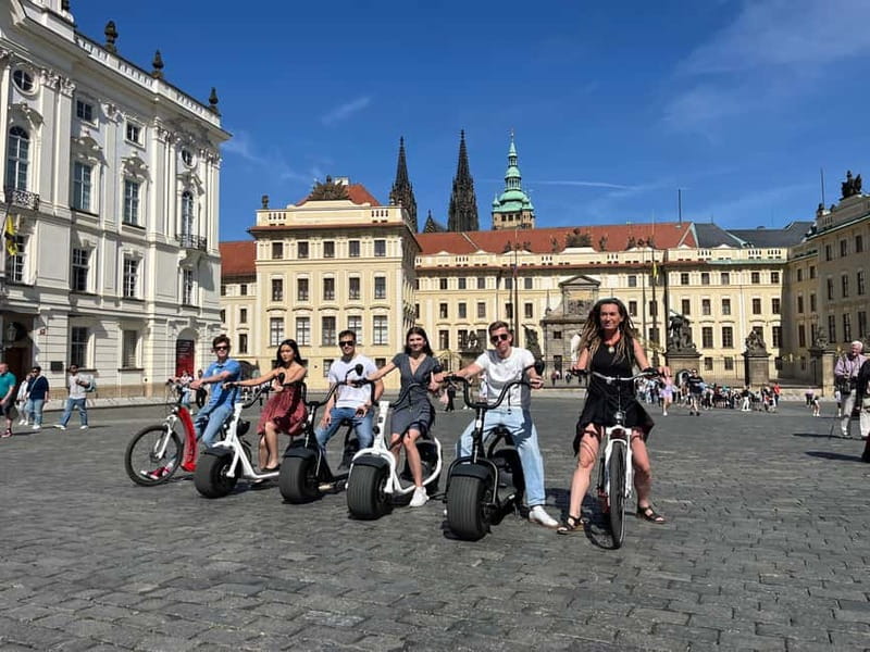 Prague: Fat Tire or Regular Scooter Tour with A Local Guide - Where the tour starts at Hotel Grandior (and how pickup works)