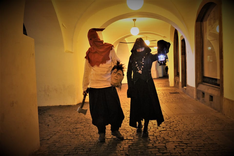 Prague: Ghosts, Legends, Medieval Underground & Dungeon Tour - Entering the Medieval Underground: plague stories and an alchemy lab