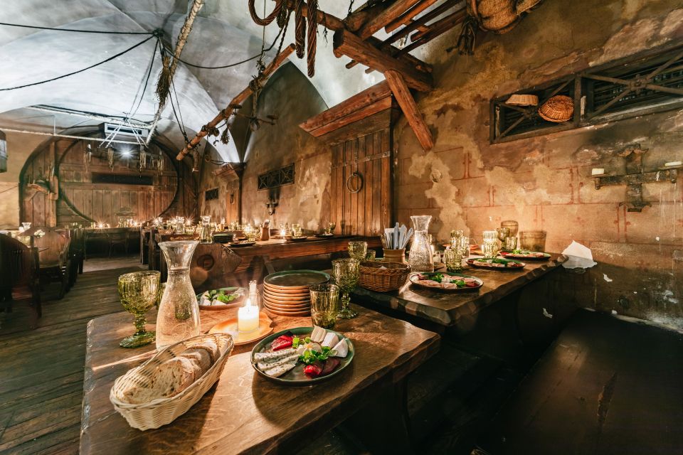 Prague: Medieval Dinner with Unlimited Drinks - Seating, Comfort, and Shared Tables in a Dark Room