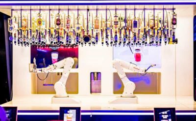 Prague: Robotic Bar Entry with a Drink Included - Finding the Karlovy lázně entrance from Charles Bridge