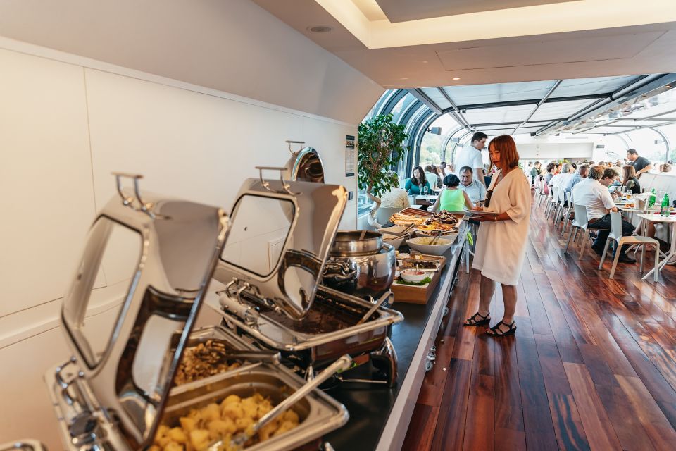 Prague: Sightseeing Dinner Cruise on Open-Top Glass Boat - Seats, glass glare, and the best way to get photos
